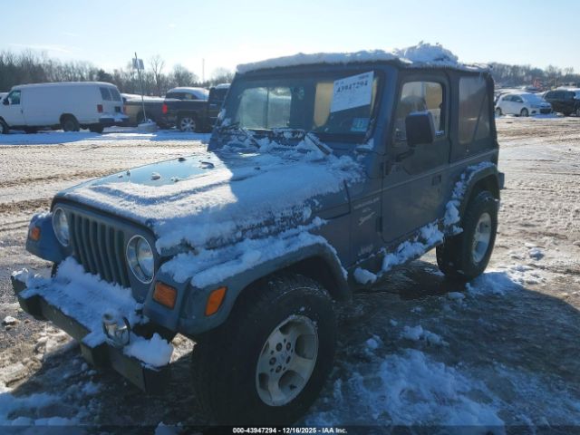 1999 JEEP WRANGLER 1J4FY19S6XP451393 Photo 1