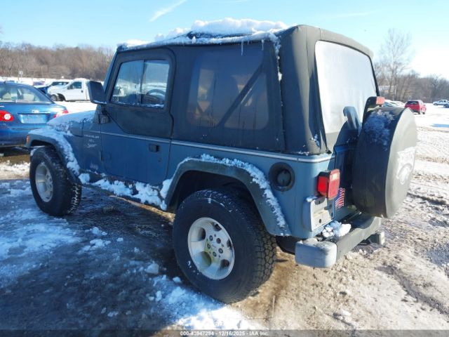 1999 JEEP WRANGLER 1J4FY19S6XP451393 Photo 2