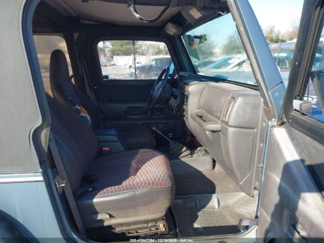 1999 JEEP WRANGLER 1J4FY19S6XP451393 Photo 4