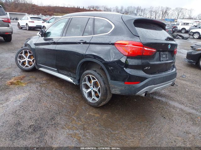 2019 BMW X1 WBXHT3C5XK3H35658 Photo 2