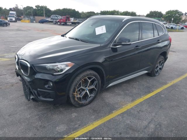 2018 BMW X1 WBXHU7C3XJ3H43776 Photo 1