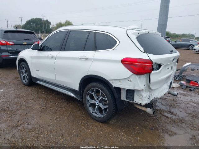 2017 BMW X1 WBXHU7C31H5H35225 Photo 2