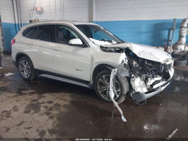 2017 BMW X1 WBXHT3Z32H4A52362
