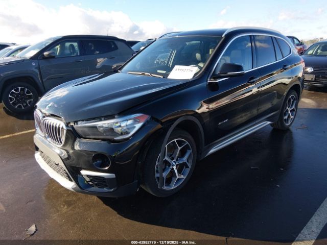 2018 BMW X1 WBXHT3C37J5K31521 Photo 1