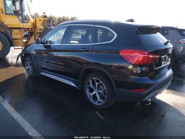 2018 BMW X1 WBXHT3C37J5K31521 Photo 2