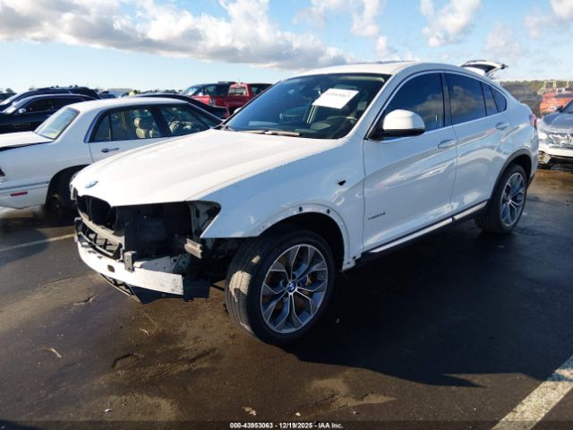 2015 BMW X4 5UXXW3C57F0M86724 Photo 1