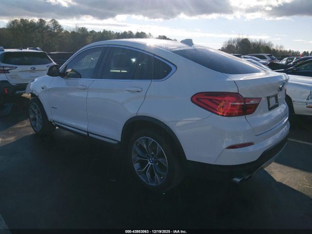 2015 BMW X4 5UXXW3C57F0M86724 Photo 2