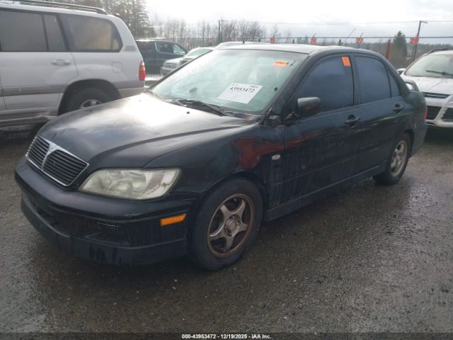 2003 MITSUBISHI LANCER JA3AJ86E63U099616 Photo 1
