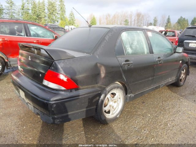 2003 MITSUBISHI LANCER JA3AJ86E63U099616 Photo 3