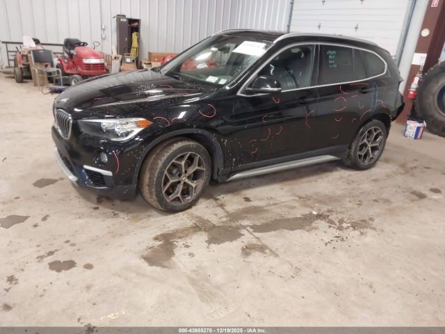2018 BMW X1 WBXHT3C31J3H33679 Photo 1
