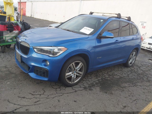 2017 BMW X1 WBXHT3C35H5F81680 Photo 1