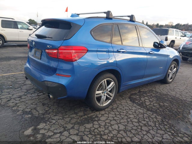 2017 BMW X1 WBXHT3C35H5F81680 Photo 3