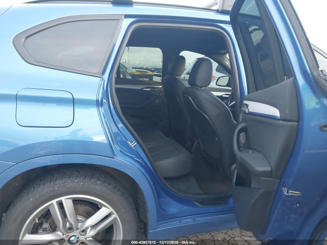 2017 BMW X1 WBXHT3C35H5F81680 Photo 7