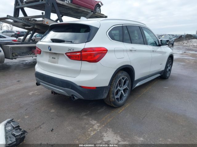 2016 BMW X1 WBXHT3C34G5F63928 Photo 3