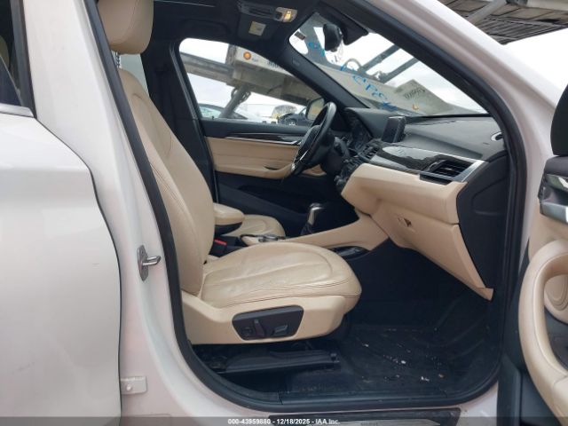 2016 BMW X1 WBXHT3C34G5F63928 Photo 4