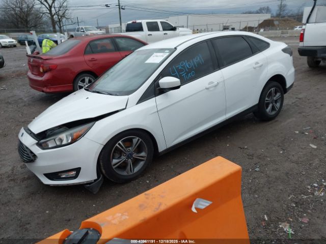 2018 FORD FOCUS 1FADP3FE3JL303295 Photo 1