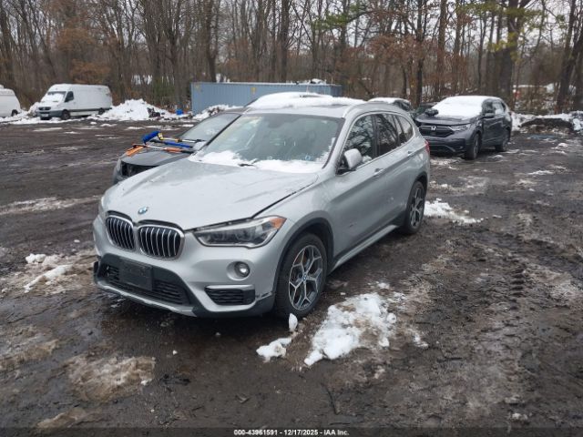 2017 BMW X1 WBXHT3C34H5F78950 Photo 1