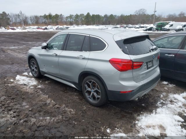 2017 BMW X1 WBXHT3C34H5F78950 Photo 2