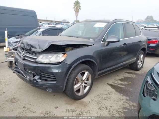2011 VOLKSWAGEN TOUAREG WVGFF9BP0BD003902 Photo 1