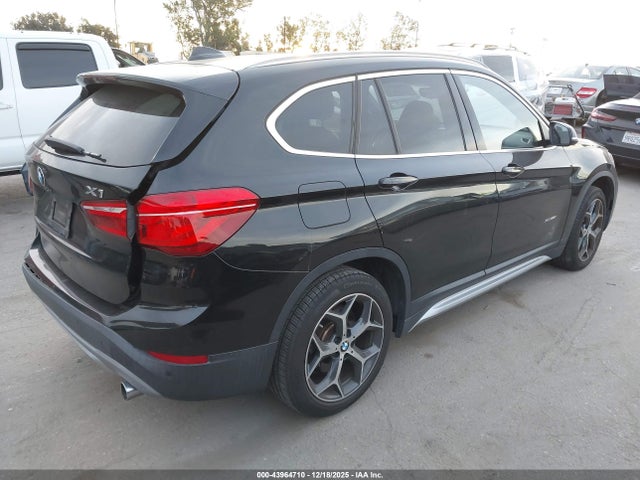 2016 BMW X1 WBXHT3Z31G4A47927 Photo 3