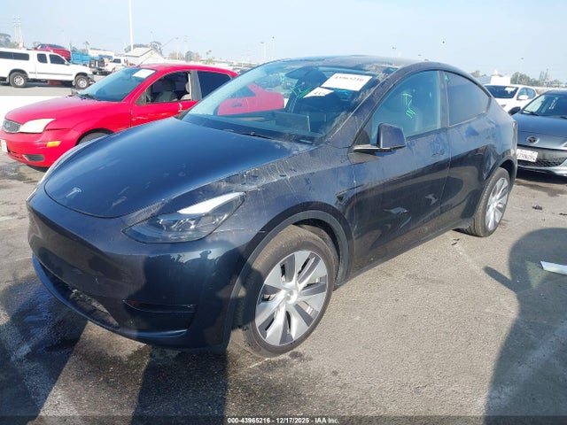 2024 TESLA MODEL Y 7SAYGDEE8RA233519 Photo 1