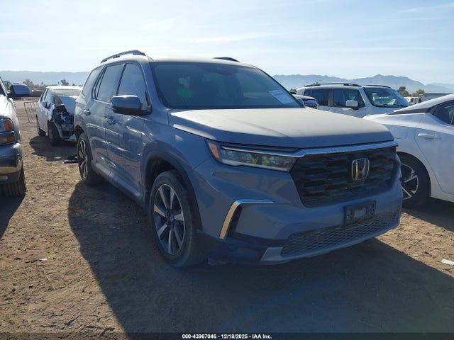 Honda Pilot 2wd Touring 2023 5FNYG2H71PB011399 main image