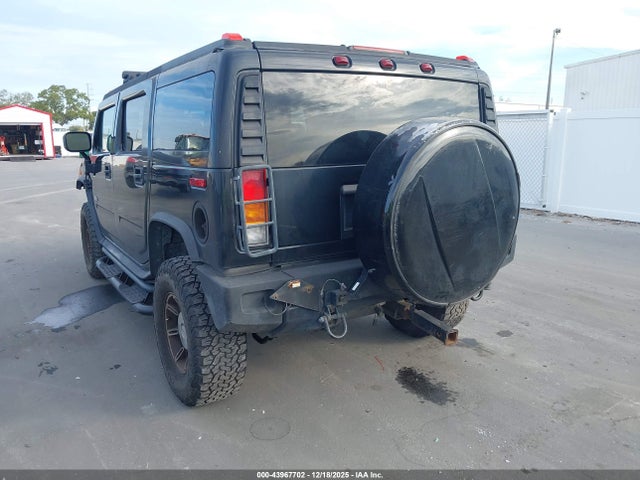 2004 HUMMER H2 5GRGN23U74H110401 Photo 2