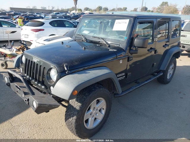 1C4BJWDG0GL128120 Jeep Wrangler Unlimited Sport