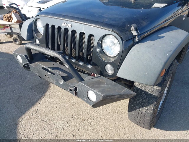 1C4BJWDG0GL128120 Jeep Wrangler Unlimited Sport