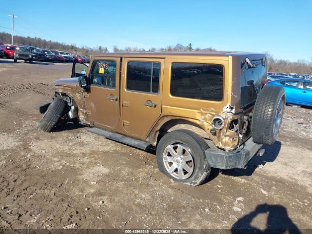 2011 JEEP WRANGLER UNLIMITED 1J4BA7H11BL581712 Photo 2
