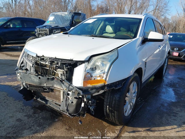 2011 CADILLAC SRX 3GYFNDEYXBS588397 Photo 1