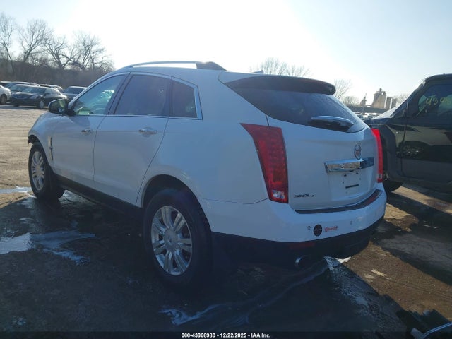 2011 CADILLAC SRX 3GYFNDEYXBS588397 Photo 2