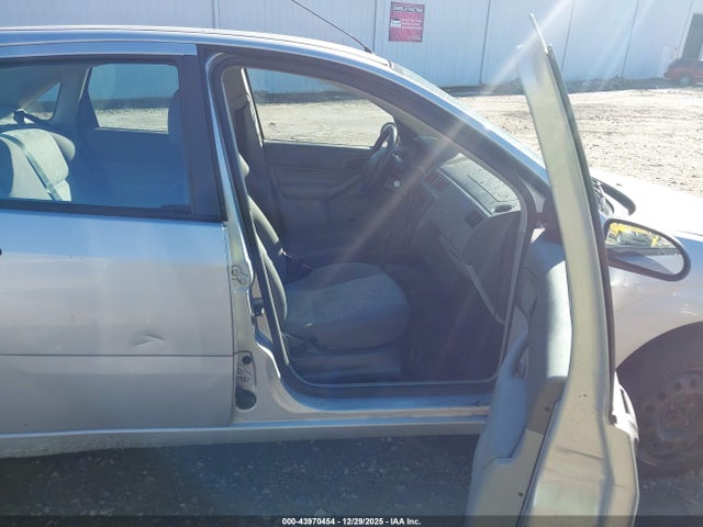 2005 FORD FOCUS 1FAFP34N75W203507 Photo 4
