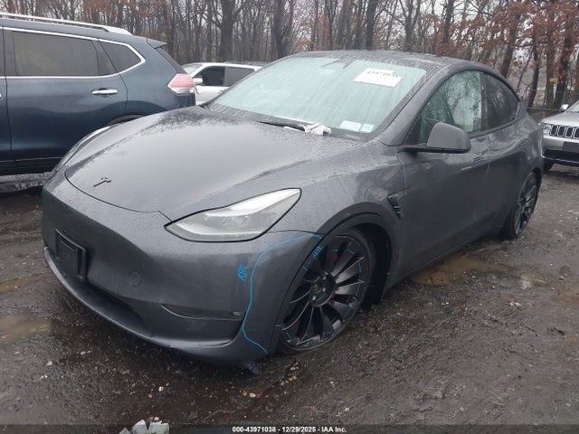 2023 TESLA MODEL Y 7SAYGDEF1PF873659 Photo 1