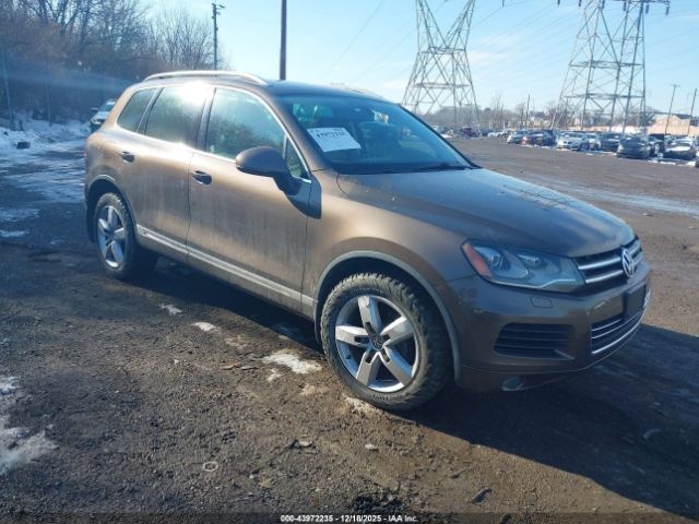 2014 VOLKSWAGEN TOUAREG WVGEF9BP4ED008178