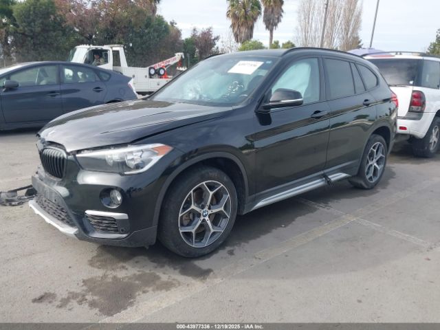 2017 BMW X1 WBXHU7C31H5H37816 Photo 1