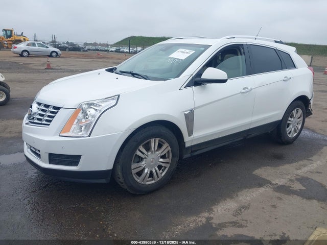 2014 CADILLAC SRX 3GYFNEE35ES598320 Photo 1