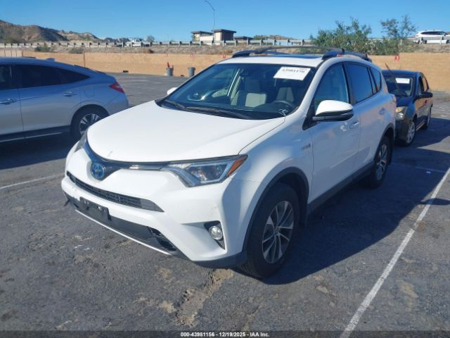 2018 TOYOTA RAV4 HYBRID JTMRJREV5JD248395 Photo 1