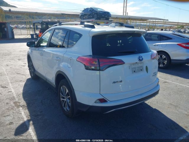 2018 TOYOTA RAV4 HYBRID JTMRJREV5JD248395 Photo 2
