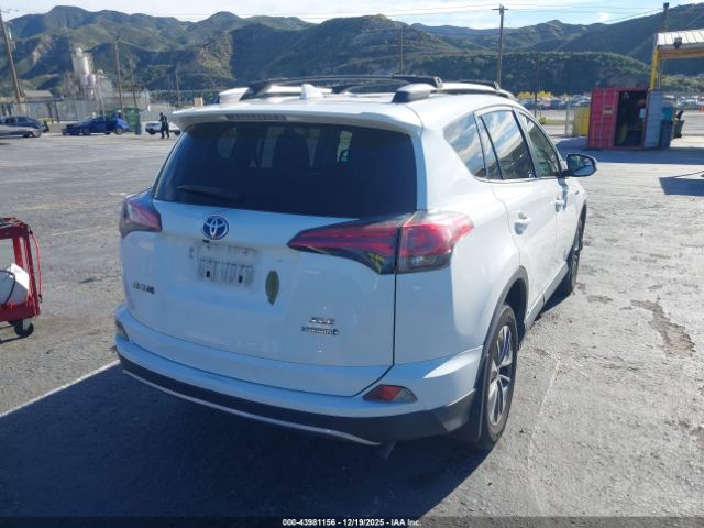 2018 TOYOTA RAV4 HYBRID JTMRJREV5JD248395 Photo 3
