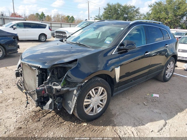 2014 CADILLAC SRX 3GYFNBE35ES631928 Photo 1