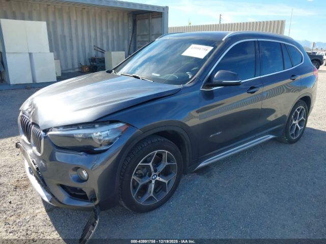 2018 BMW X1 WBXHT3C37J5F90886 Photo 1