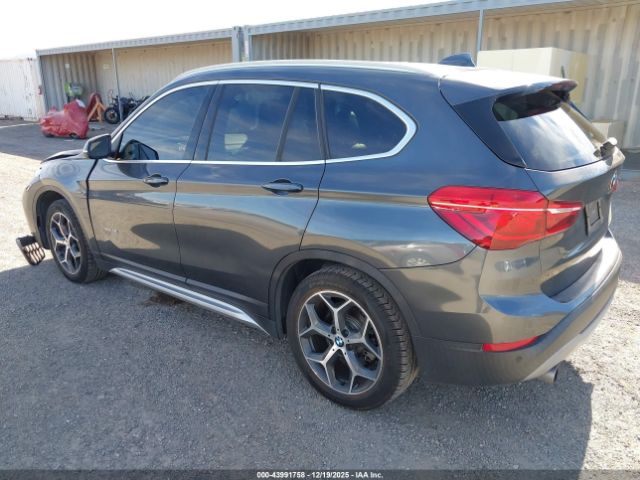 2018 BMW X1 WBXHT3C37J5F90886 Photo 2