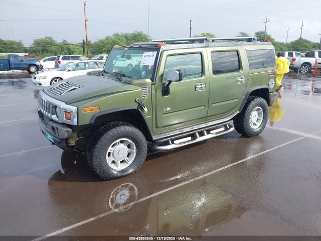 2004 HUMMER H2 5GRGN23U74H107272 Photo 1