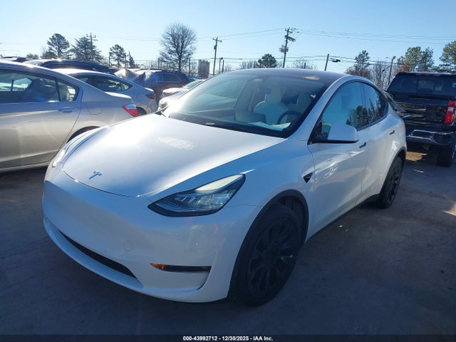 2022 TESLA MODEL Y 7SAYGDEE0NF370077 Photo 1