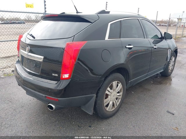 2014 CADILLAC SRX 3GYFNEE33ES615339 Photo 3