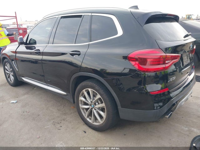 2019 BMW X3 5UXTR7C59KLE96454 Photo 2