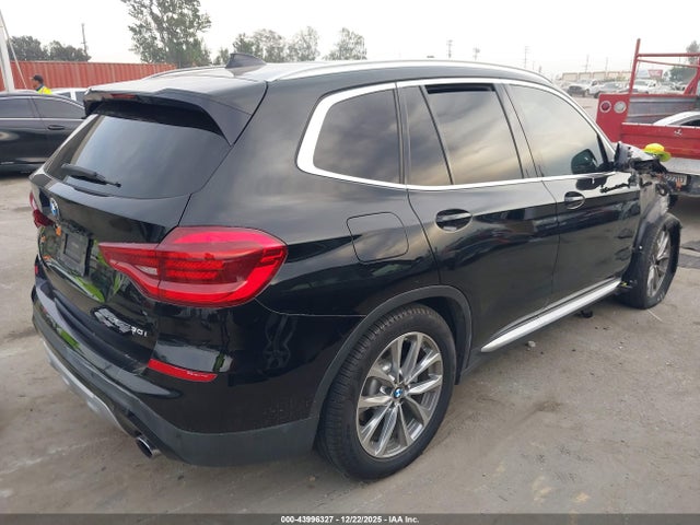 2019 BMW X3 5UXTR7C59KLE96454 Photo 3