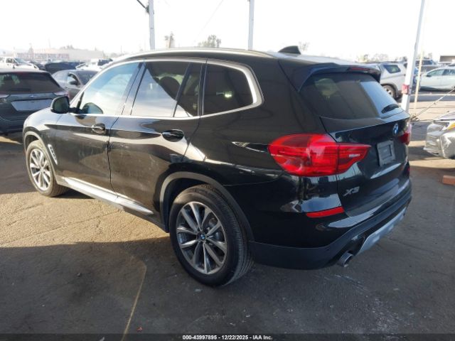 2019 BMW X3 5UXTR7C52KLF29391 Photo 2