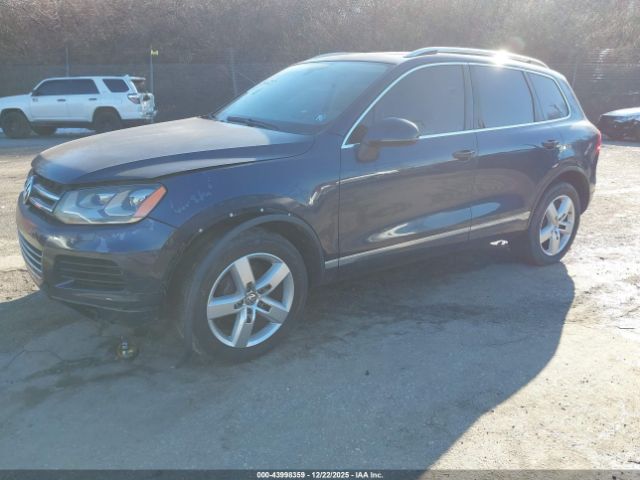 2011 VOLKSWAGEN TOUAREG WVGFK9BP9BD001514 Photo 1